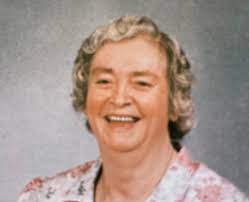 Grandfather Hixon baptizing in the creek.