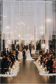 Aria Wedding In Minneapolis Mn With Hanging Chandeliers And Flowers Minnesota Wedding Venues Mn Wedding Venues Industrial Wedding Venues