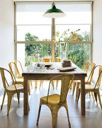 Love The Rustic Farmhouse Style Table With The Country Colored Metal Chairs Modern Farmhouse Dining Room Decor Modern Farmhouse Dining Rustic Modern Kitchen