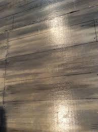 Plywood Floor Painted In A Distressed Driftwood Finish Plywood Flooring Plywood Flooring Diy Flooring