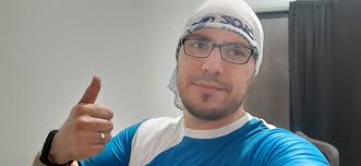 Coach Adrian Holguin