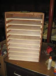 You can build one of out reclaimed wood or from plywood. Kids Puzzle Storage Ideas Novocom Top