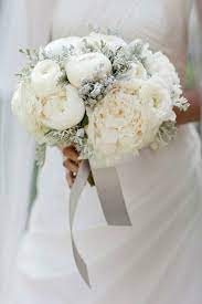Calla lilies have a chic modern edge, roses give off an air of classic romance and peonies lend that lush, whimsical feeling to any arrangement. Pin On Wedding Bouquet White