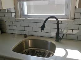 I'm wondering if you used 1/16. White Subway Tile Backsplash With Charcoal Gray Grout White Subway Tile Backsplash Condo Kitchen White Subway Tile
