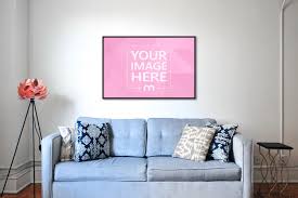 An oversized canvas print can set the tone for any room, from quaint intimate spaces to large open lofts or even businesses and conference rooms. Poster On Living Room Wall Mockup Mediamodifier