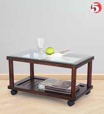 However, you can also make your coffee table into an extra storage space, as many of them come with drawers and shelves inside them. Storage Glass Coffee Table Online Furniture Store India