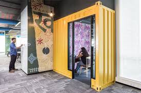 A Tour Of Booking Com S Cool Mumbai Office Beautiful Office Spaces Workplace Design Phone Booth Office