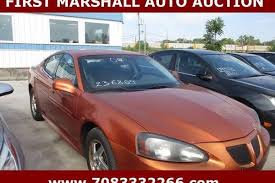 Image result for Sunburst Orange 2004 Pontiac
