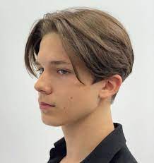 No hairstyle for men channels the 1990s vibe like curtain haircut. The Curtain Haircut Interesting Ways To Wear Curtains In 2021 Boy Haircuts Long Men Hair Color Middle Hair