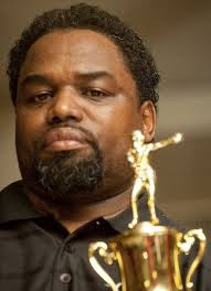 Three Flint boxers attempt to put F.W.C Berston back