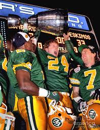 Mackenzie dayle bilingual national anthem edmonton eskimos vs. Edmonton Eskimos 1993 Grey Cup Dan Murphy Hoisting Grey Cup Photograph By Terry Elniski