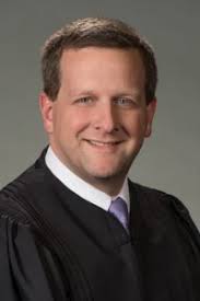 County or Sheriff? Presentment Challenge Leads to Interpretive Divide