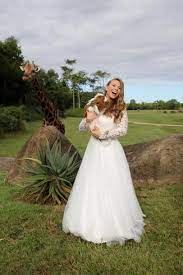 Bindi irwin dramatically altered wedding plans due to coronavirus: Bindi Irwin S Wedding Dress Cake Vows And Tribute To Steve Irwin Dnews Discovery