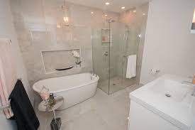 According to the judges, the restroom's concrete countertops and fancy tile place it a cut above the rest as the most unbelievable campground washroom anywhere. Modern Washroom In Town House With Curb Less Shower And Free Standing Tub Design And Build By Bathroom Inspiration Modern Washroom Design Zen Bathroom Design