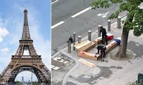 Moscow is accused of psychological warfare after coffins inscribed with  'French soldiers of Ukraine' are left at the foot of the Eiffel Tower after  Macron suggested sending Western troops to fight Russia |