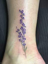 125 Best Flower Tattoos Tattoo Ideas In 2021 Lavender Tattoo Tattoos Larkspur Tattoo
