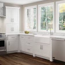 I used the same paint to touch up the crown molding. Ideal Cabinetry Waterford Vivid White Home Magic Llc