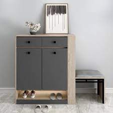 It features an asymmetrical design with two wide shelves and one tall shelf, so there's plenty of space for clutter or decor. 20 Pair Shoe Storage Cabinet Multi Functional Shoe Organizer 2 Drawer Entryway Cabinet Gray