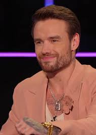 Liam Payne's girlfriend Kate Cassidy has released never-before-seen photos  and videos of the singer in an emotional birthday tribute.