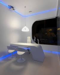 Modern And Futuristic Office In Blue Glowing Light Hidrosalud Office Home Building Furniture Futuristic Home Futuristic Interior Modern Office Interiors