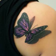 This tattoo incorporating lotus flowers and a purple butterfly taking flight can be a symbol of remembrance and hope. Top 61 Best Purple Butterfly Tattoo Ideas 2021 Inspiration Guide