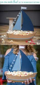 Ship Party Snacks With This Diy Paper Sailboat Centerpiece Nautical Birthday Party Kids Party Party Table Centerpieces