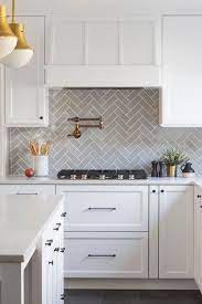 Offering the best selection of backsplash tile available in the us. Ceramic Tile Kitchen Back Splash In Herringbone Pattern Kitchen Backsplash Designs Gray Kitchen Backsplash Kitchen Trends