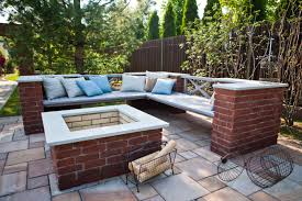 This seating area and outdoor fireplace blend seamlessly with the garage behind it. 4 Ideal Seating Solutions For Your Outdoor Fireplace Landworx Of Ny Landscape Design And Build Goshen Ny Hudson Valley Landscaping Company