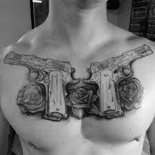 Beyond this, he was also innovative on a more technical level, pioneering modern tattoo machine configurations, sterilization techniques and purple ink. 50 1911 Tattoo Ideas For Men Handgun Designs Tattoos Money Tattoo Mark Tattoo