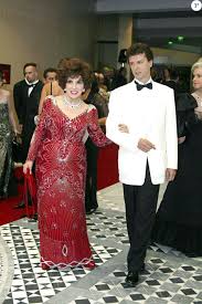 Destined to be called the most beautiful woman in the world, gina possibly had st. Gina Lollobrigida Accompagnee De Son Amant Javier Rigau Rafols Au Bal De Croix Rouge A Monaco Le 2 Aout 2006 Purepeople