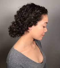 Try a playful style like these space buns. 17 Cute And Easy Curly Updos For Curly Hair