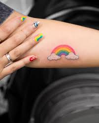 See more ideas about tattoos, rainbow tattoos, body art tattoos. Little Rainbow Tattoo Doozy List