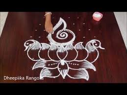 Creative Lotus Shank Rangoli Design With 9x5 Dots Peacock Lotus Kolam Design Easy Friday M Rangoli Designs Flower Rangoli Patterns Rangoli Designs With Dots