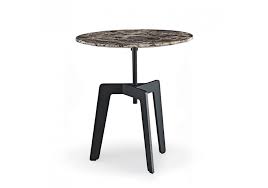Our tribeca coffee table's tapered and sculpted limbs echo forms found in nature. Tribeca Coffee Table Poliform Milia Shop