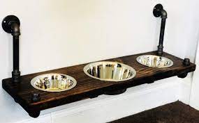 It is a simple wooden design with bowls fitted on separated square pieces. Amazon Com Large 3 Bowl Floating Wood Elevated Wall Mounted Dog Bowl Stand Industrial Pipe Dog Rustic Dog Bowls Raised Dog Bowl Handmade