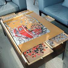Unnecessary inventions' playful coffee table offers a clever commentary on some assembly required furniture. Buy Atdawn 1500 Pieces Upgraded Wooden Jigsaw Puzzle Table Jigsaw Puzzle Board Puzzle Plateau Smooth Fiberboard Work Surface With Five Drawers Puzzle Accessories For 1500 Pcs Online In Turkey B08rrxst8j