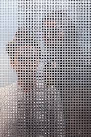 Intriguing Photographs Of People Shot Through Perforated Screens Raw Color Designtaxi Com Raw Color Perforated Screen