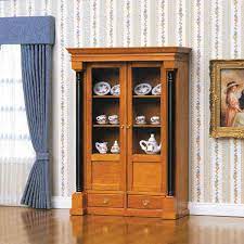 Featuring a sturdy composite box and a solid wood door frame, this utility cabinet has 1 storage drawer that helps you store many household items. Biedermeier Display Cabinet 40096