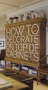Maybe you would like to learn more about one of these? How To Decorate The Top Of A Cabinet And How Not To Designed Home Goods Decor Decorating On Top Of Cabinets Home Decor