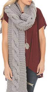 What is a super scarf? Free Knitting Pattern For Audrey Super Scarf Easy Scarf Features A Giant Central Cable Finished Size 9 Super Scarf Scarf Knitting Patterns Womens Knit Scarf