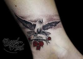 The design of a dog memorial tattoo can range in style from simple to complex, from black and white to vibrant colors. 30 Dove And Rose Tattoo Designs For Men And Women Entertainmentmesh