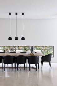 8 Lighting Ideas For Above Your Dining Table Three Pendant Lights If You Re Going To Hav Minimalist Dining Room Dining Room Remodel Dining Table Lighting