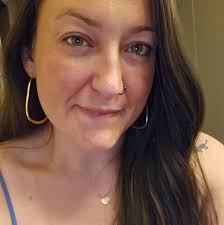 What are some recommended tattoo shops in Sylva, NC for an artistic bear  tattoo?