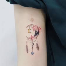 A dream catcher is a magical item that you can place above your bed and the idea is that it will catch any bad dreams so that you don't have to experience them yourself. Great Small Dreamcatcher Tattoo Design Body Tattoo Art