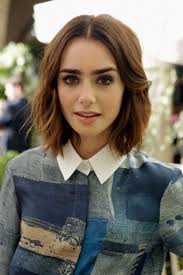 Lily Collins short wavy hair.