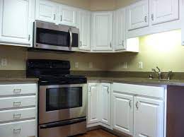 Rtf White Refaced Cabinets In An Apartment Kitchen Cabinet Refacing Apartment Kitchen Cabinet