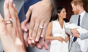 Meghan is known to favor dainty jewelry, and perhaps the redesign stemmed from a desire to have a cohesive set of three rings: Meghan Markle Wedding Ring How Meghan Changed Her Engagement Ring Spot The Differences Royal News Express Co Uk