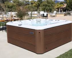 Problem being the hottub will be perfectly level and may show the slope being it will need to be to steep to shed water properly. Modern Backyard Living Blog For Sundance Spa Owners