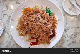 Because chinese new year is never complete without a round (or ten) 'yee sang'. Yee Sang Yusheng Dish Image Photo Free Trial Bigstock