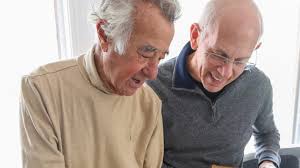 Morris Perelmuter family returns music books to Louisville library